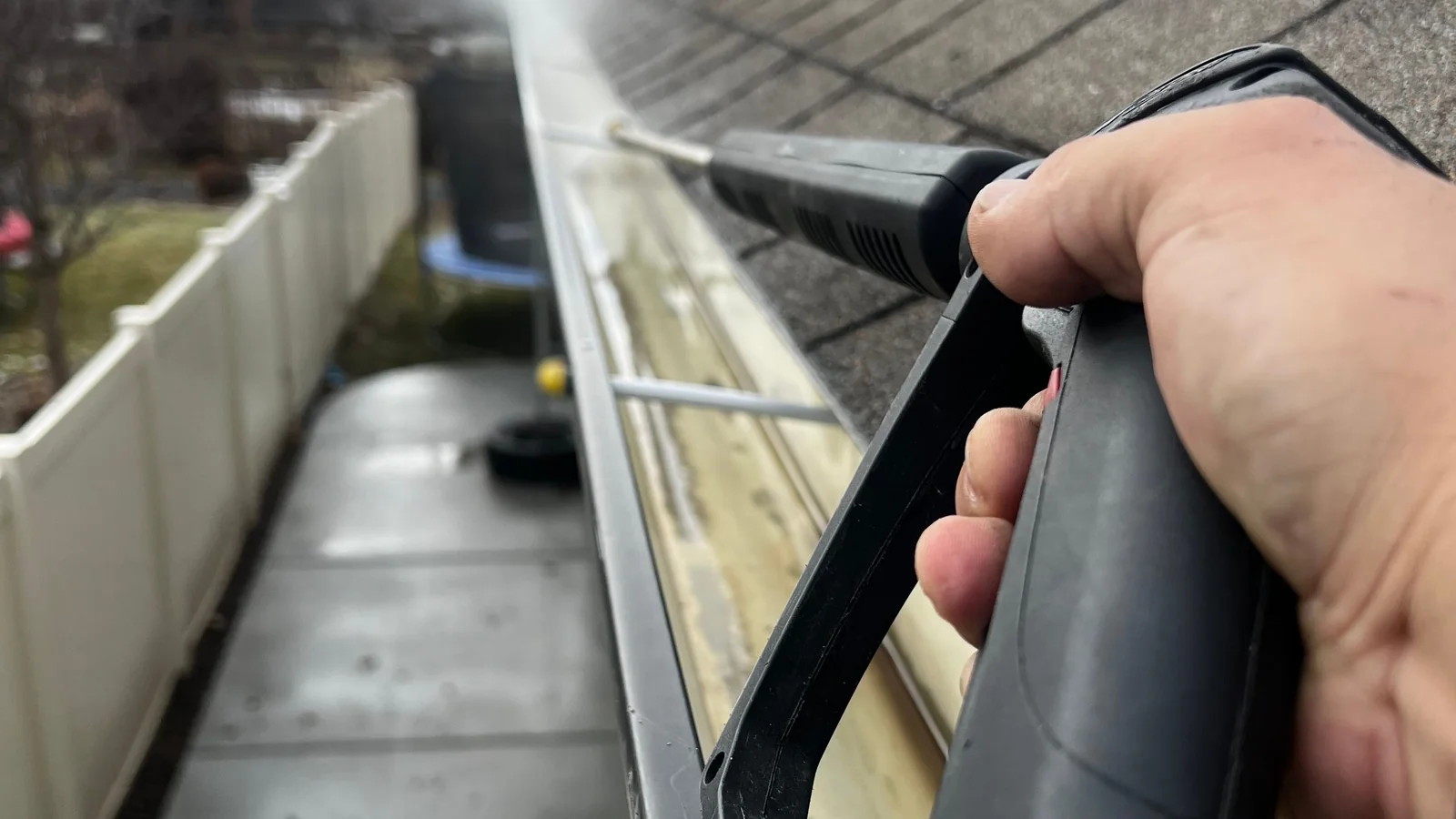 Hurricane preparation in North Carolina includes clearing gutters and downspouts before heavy rain